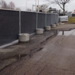 Temporary Chain Link Fence on Concrete Stands with Black Windscreen