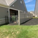 Adobe PVC privacy fence with Aluminum gate  